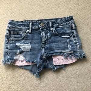 american eagle jean shorts with pink pockets